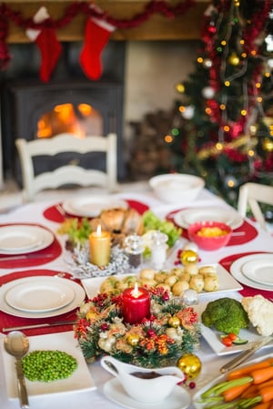 Christmas dinner table with food at home in the living room